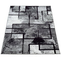 Modern Black-White Area Rug with Abstract Paint Effect - 4'7" x 6'7"